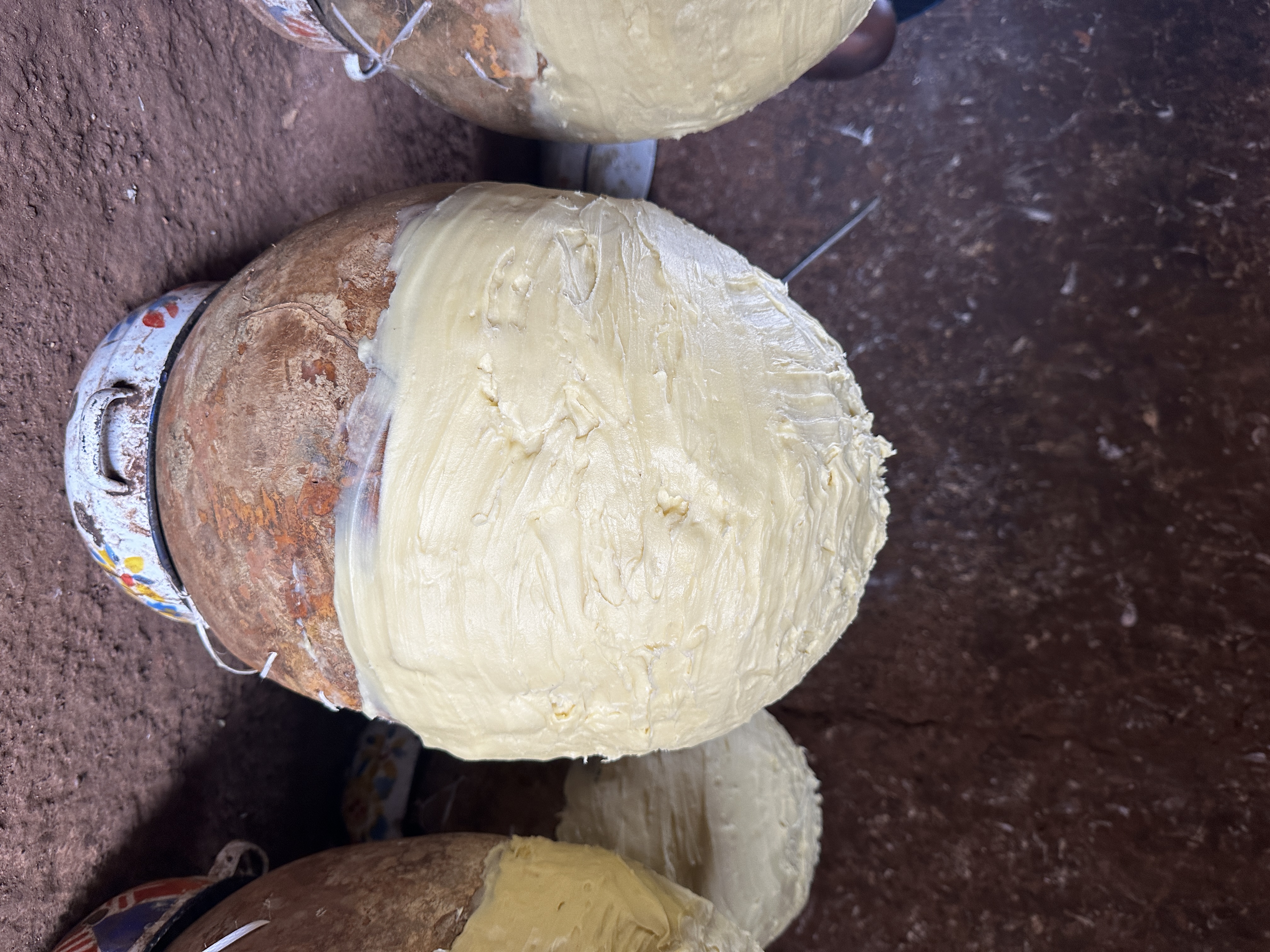 Large calabashes filled with unrefined shea butter, Northern Ghana