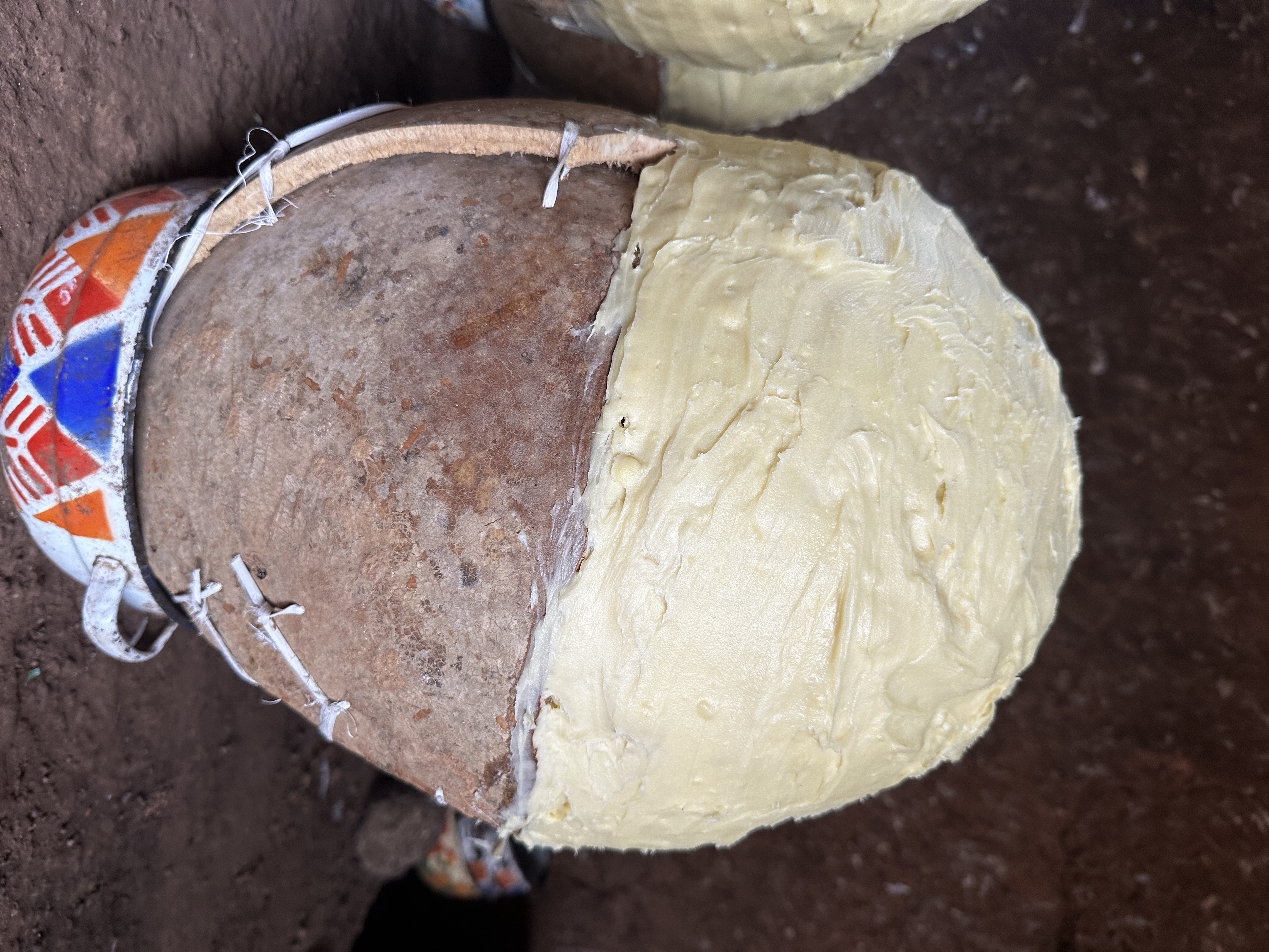 Traditional calabash packed with shea butter, Northern Ghana